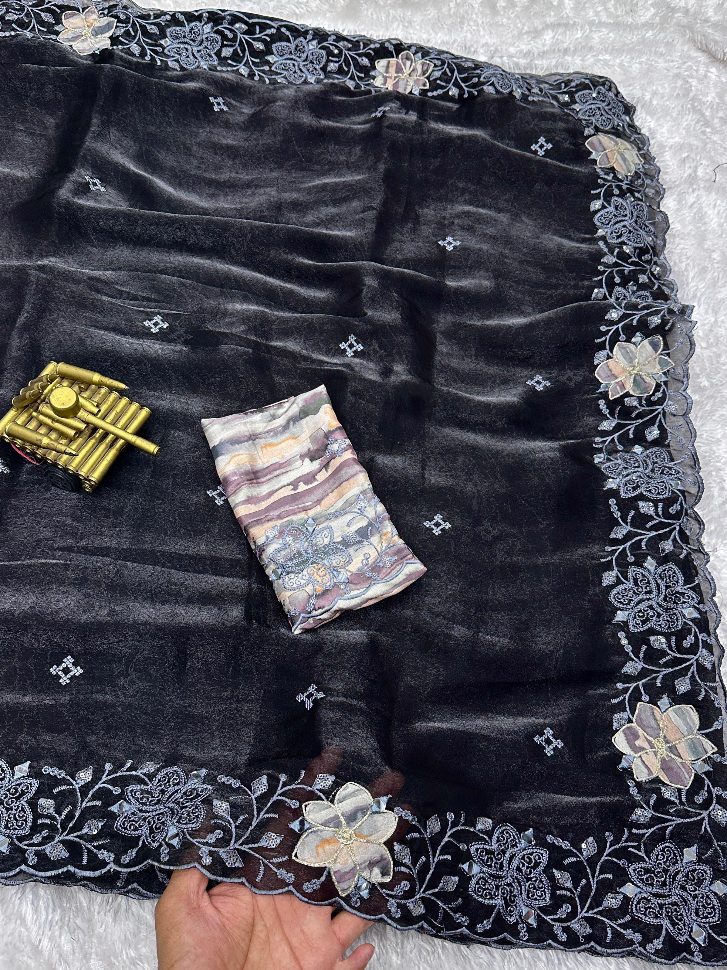 Elegant Fendi organza saree with sequin and mirror embroidery