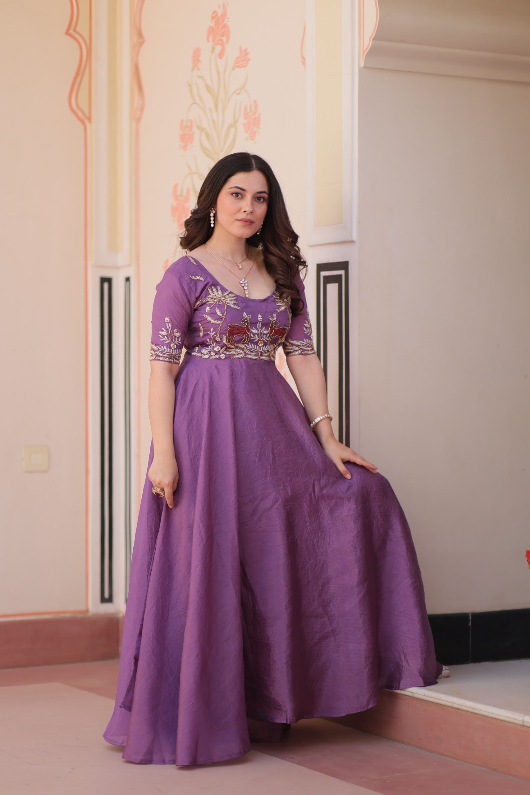 Premium gold gown with intricate bead embroidery work