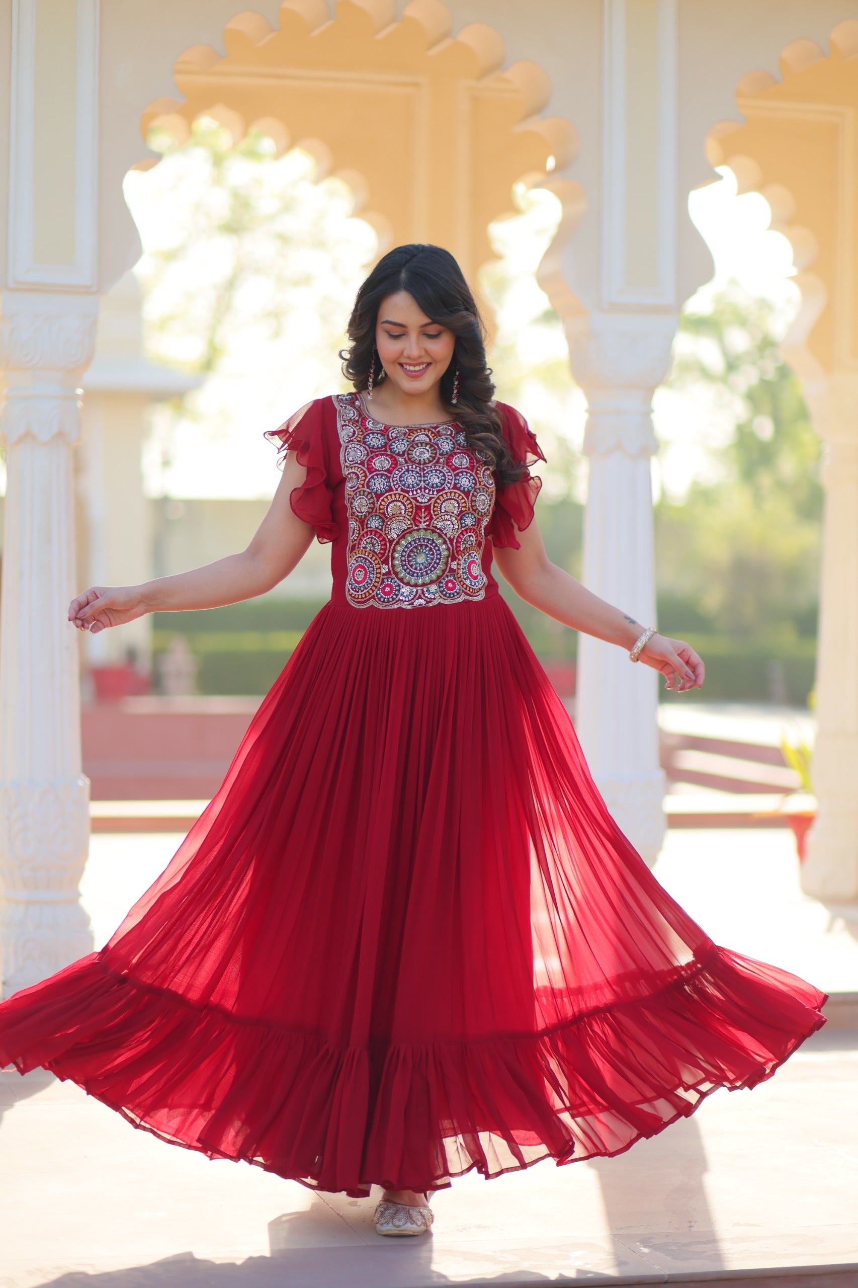 Faux Blooming embroidered gown with beads and sequins work