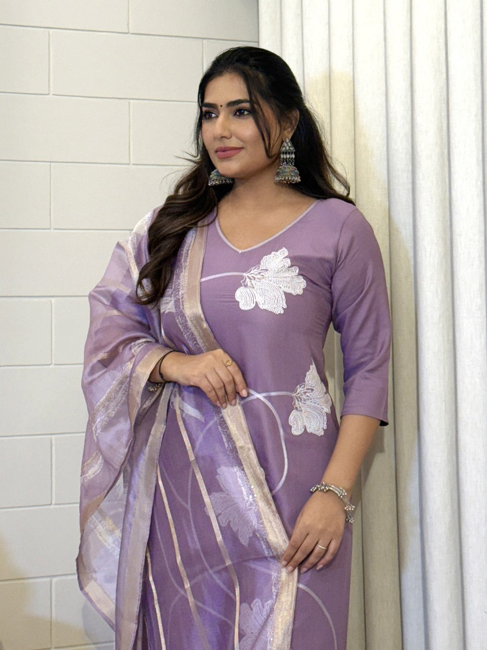 “Viscose rayon suit with sequins embroidery and organza jacquard dupatta”