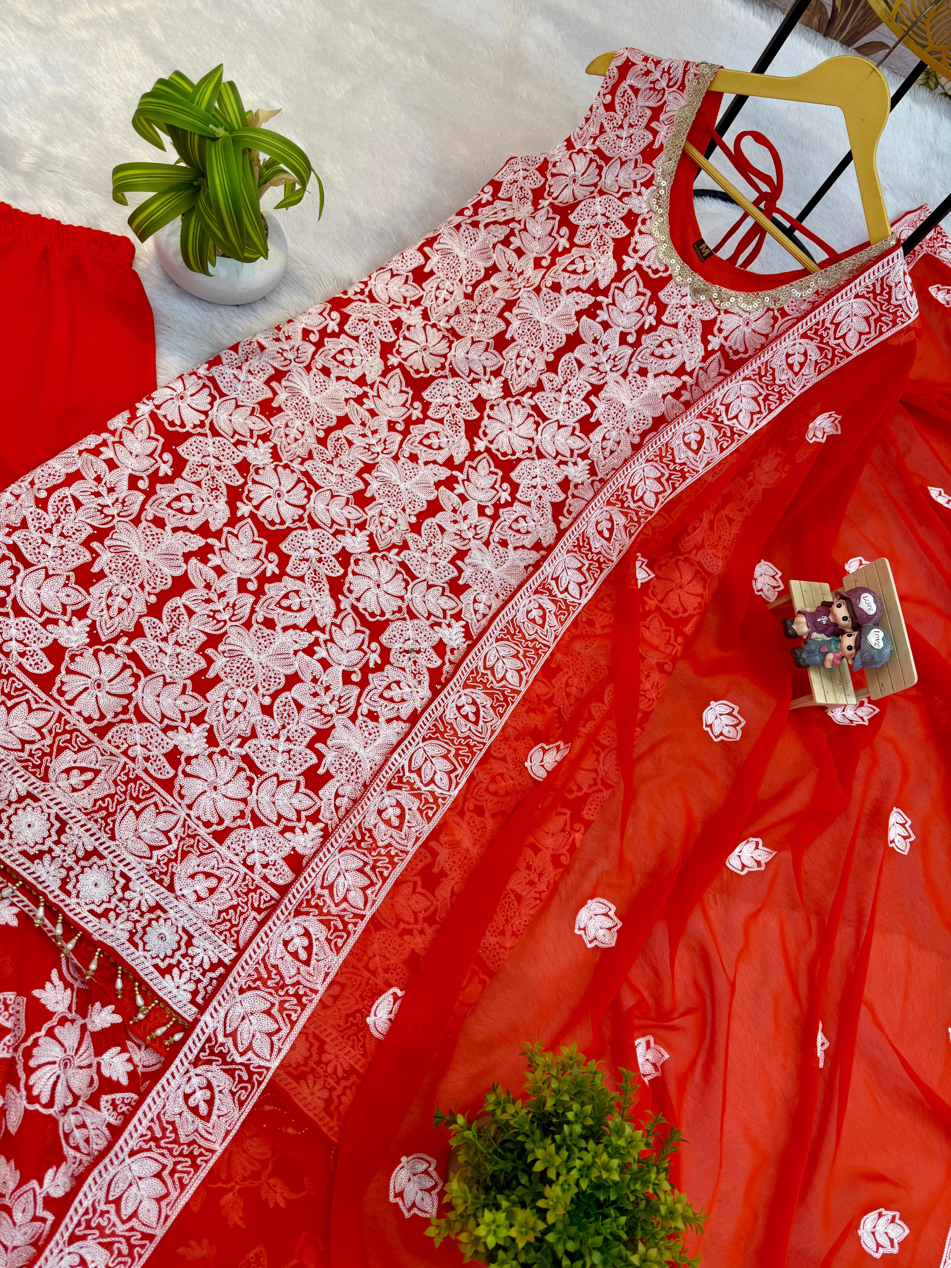 Traditional Indian women’s embroidered suit with dupatta