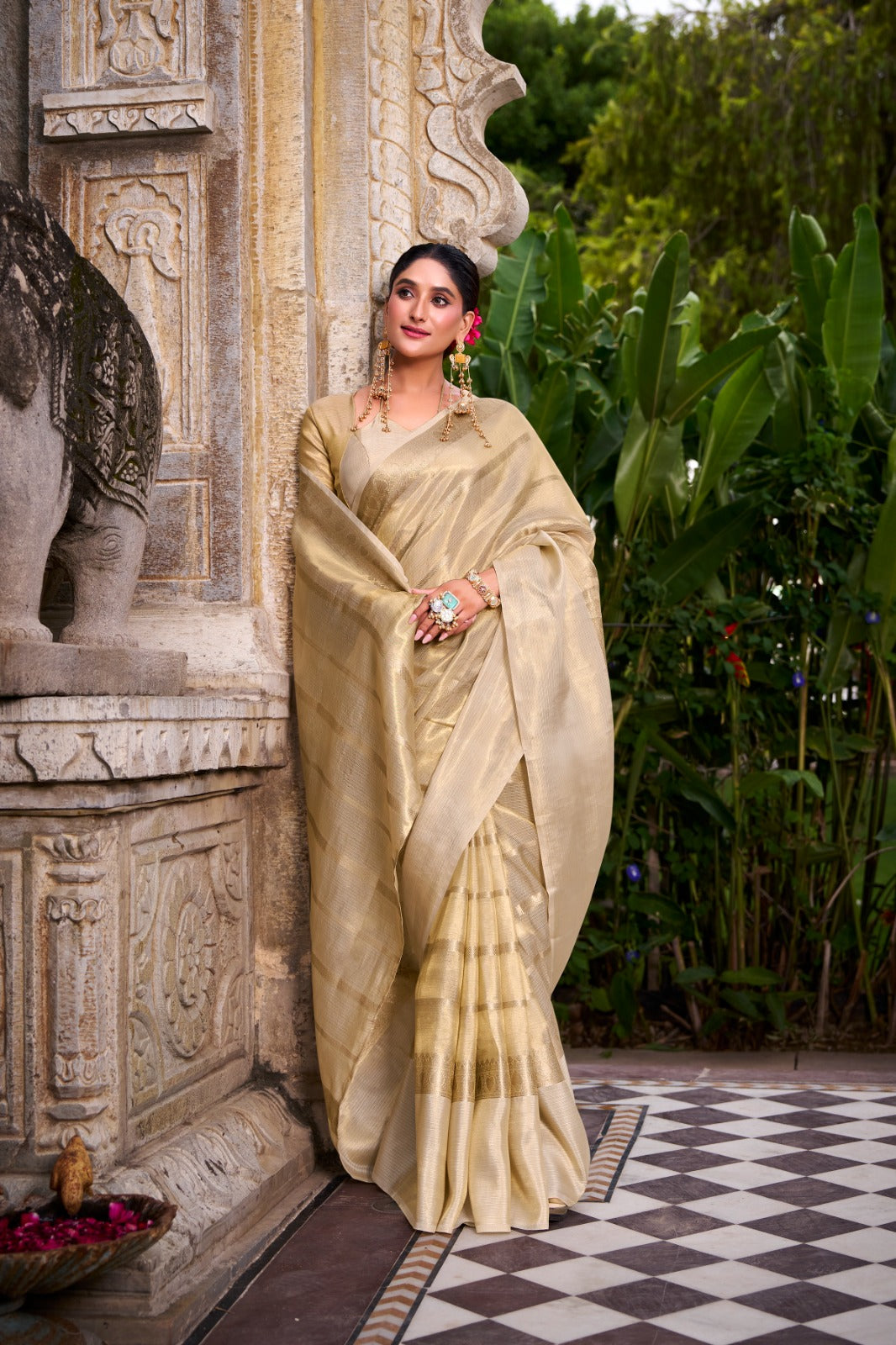 Grace meets grandeur in this Gold Tissue Saree