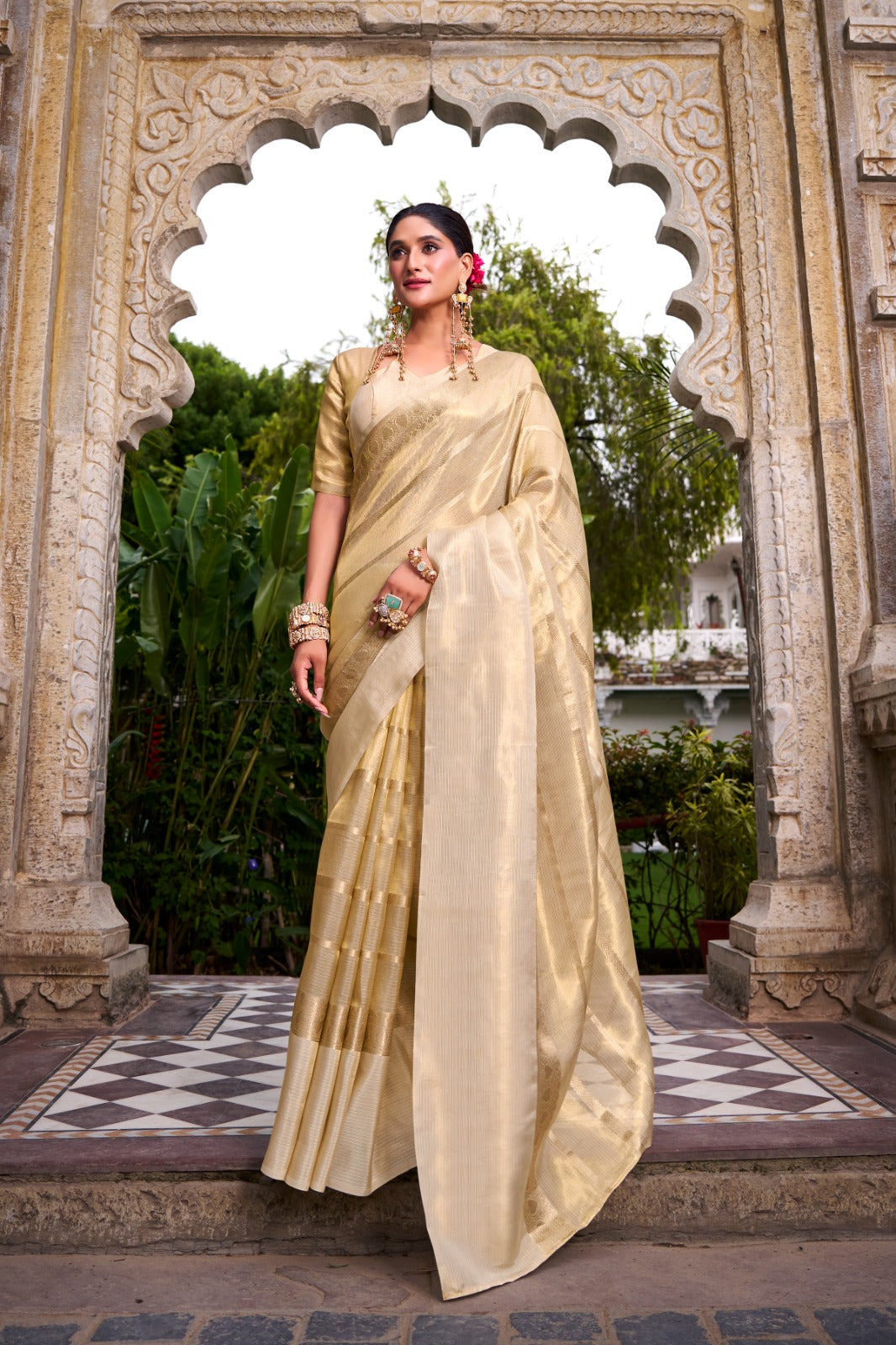 Grace meets grandeur in this Gold Tissue Saree