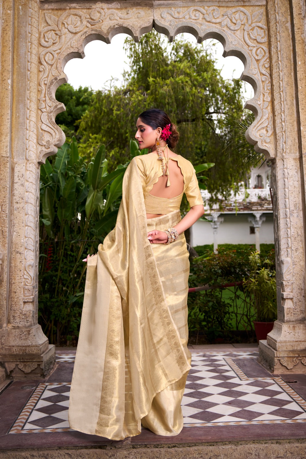 Grace meets grandeur in this Gold Tissue Saree