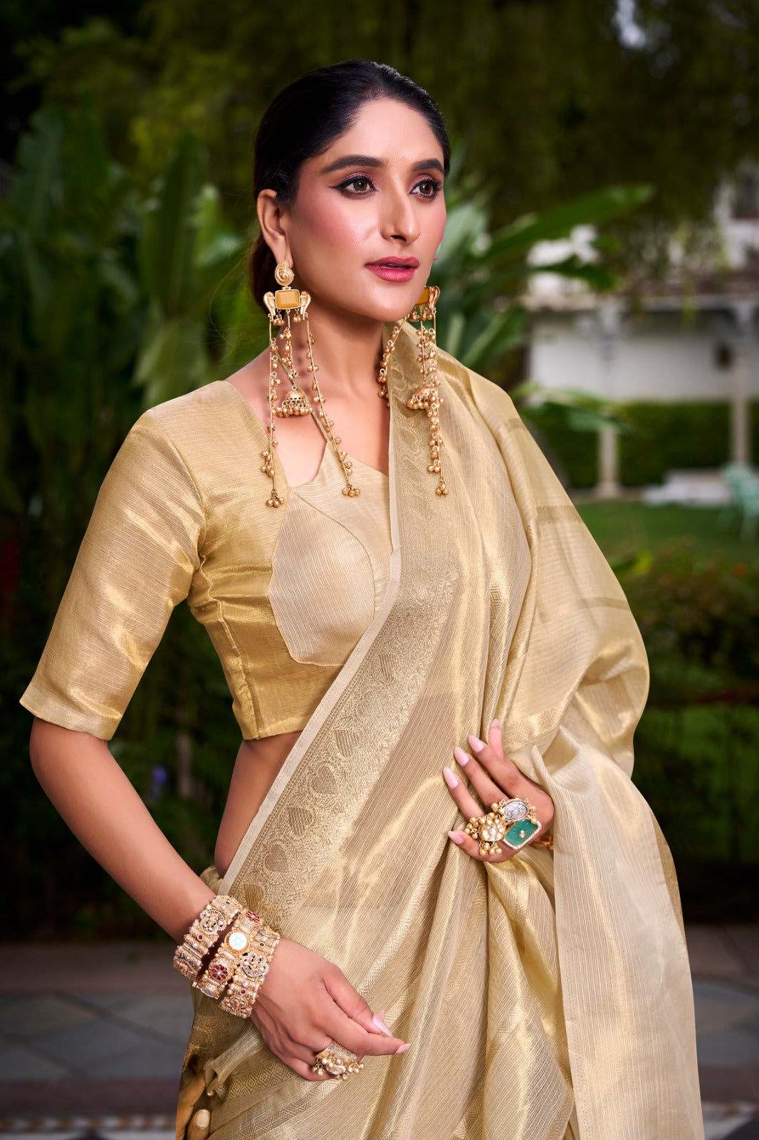 Grace meets grandeur in this Gold Tissue Saree
