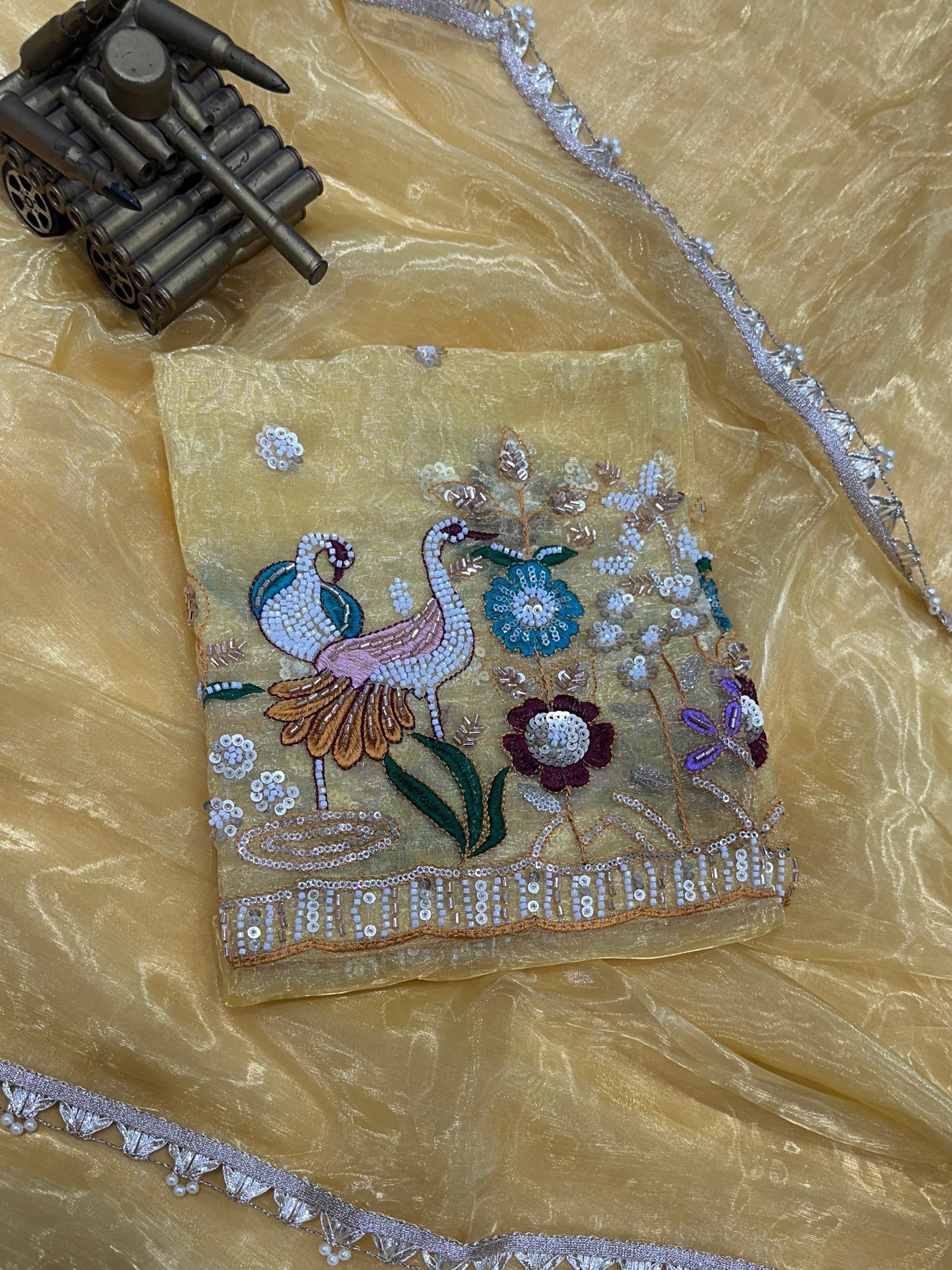 Bring home timeless elegance with this Liquid Organza Saree