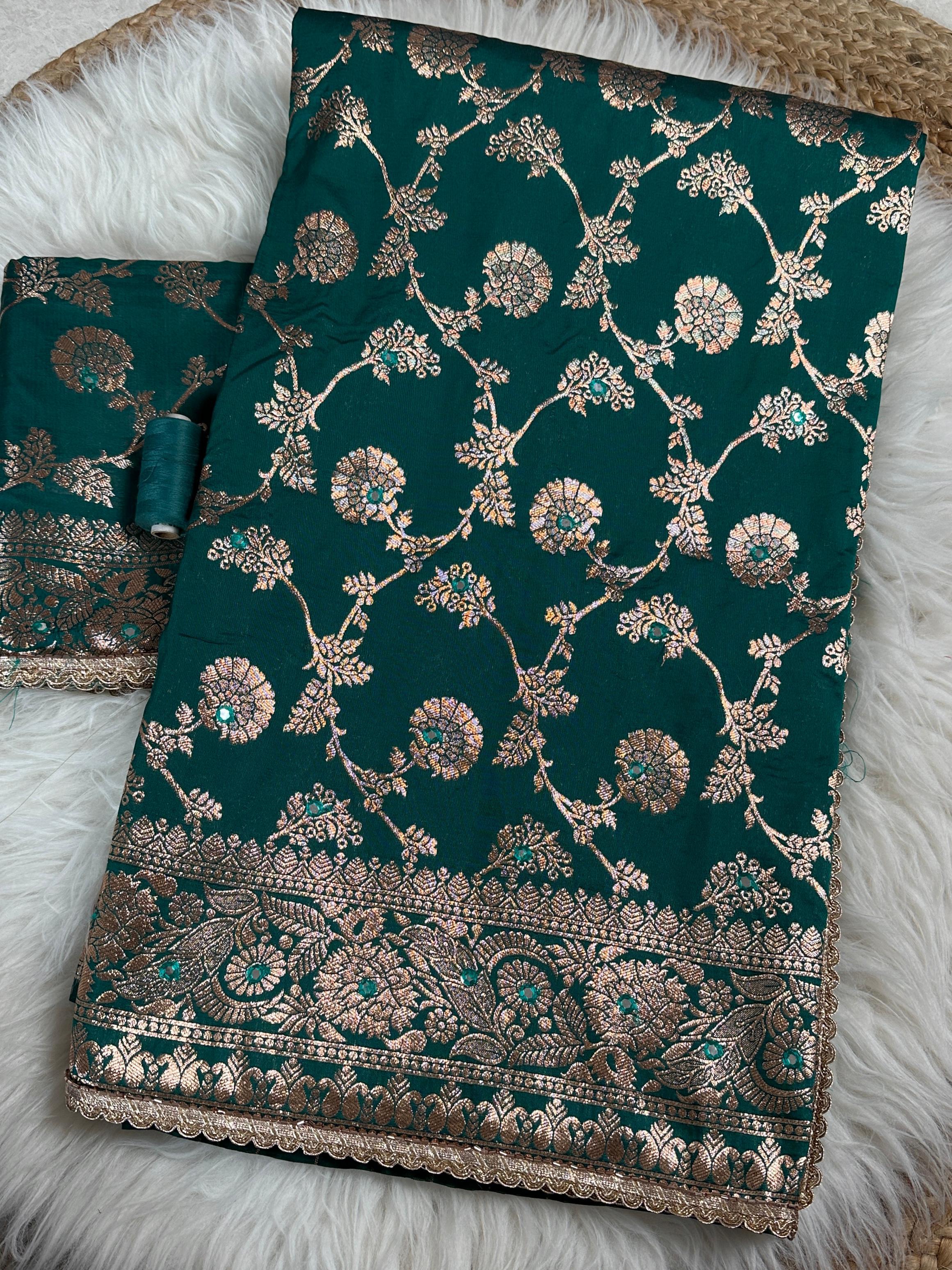 this Banarasi Silk Saree is designed to make your festive moments shine.
Featuring zari jacquard weaving