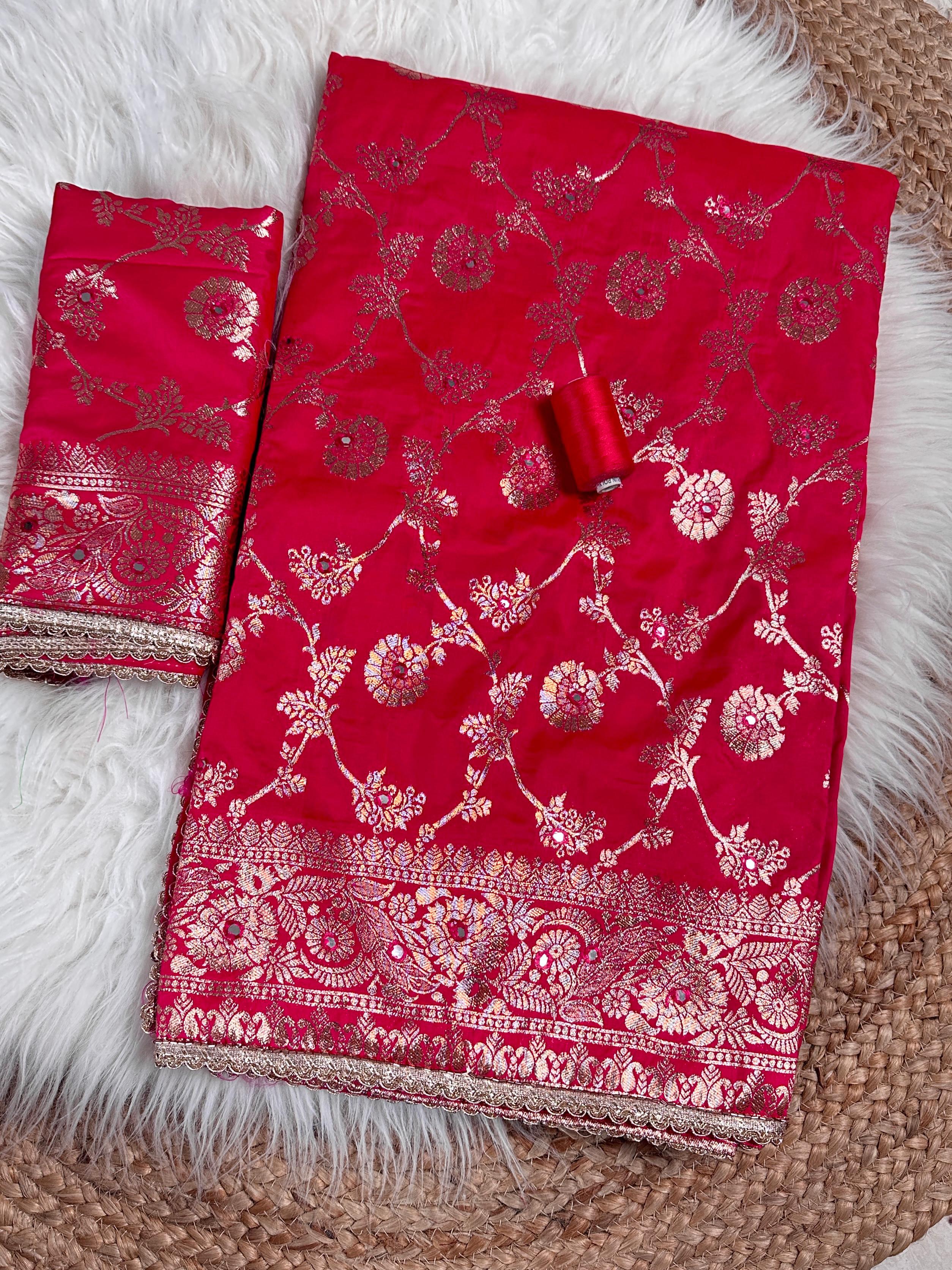 this Banarasi Silk Saree is designed to make your festive moments shine.
Featuring zari jacquard weaving