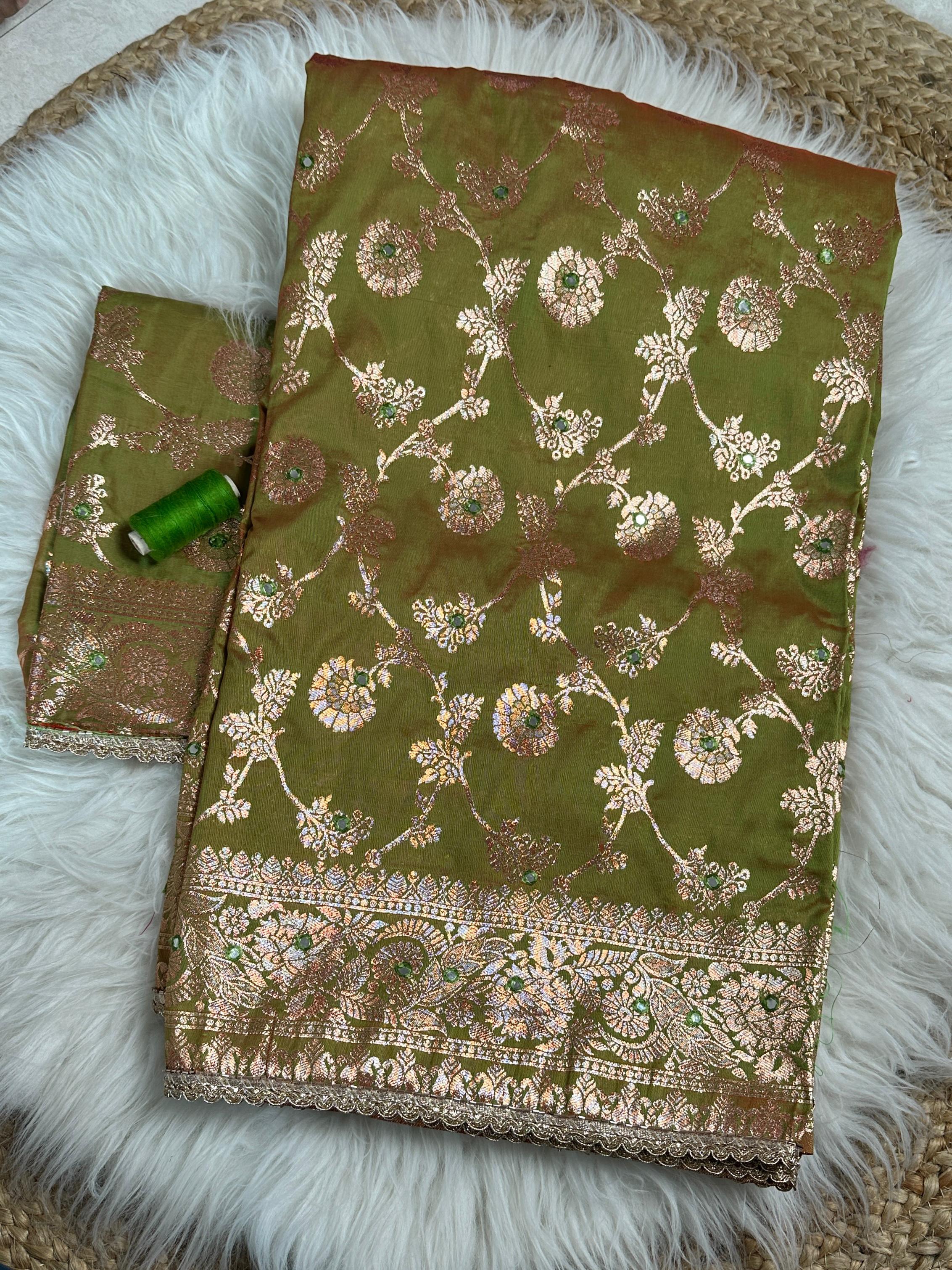 this Banarasi Silk Saree is designed to make your festive moments shine.
Featuring zari jacquard weaving