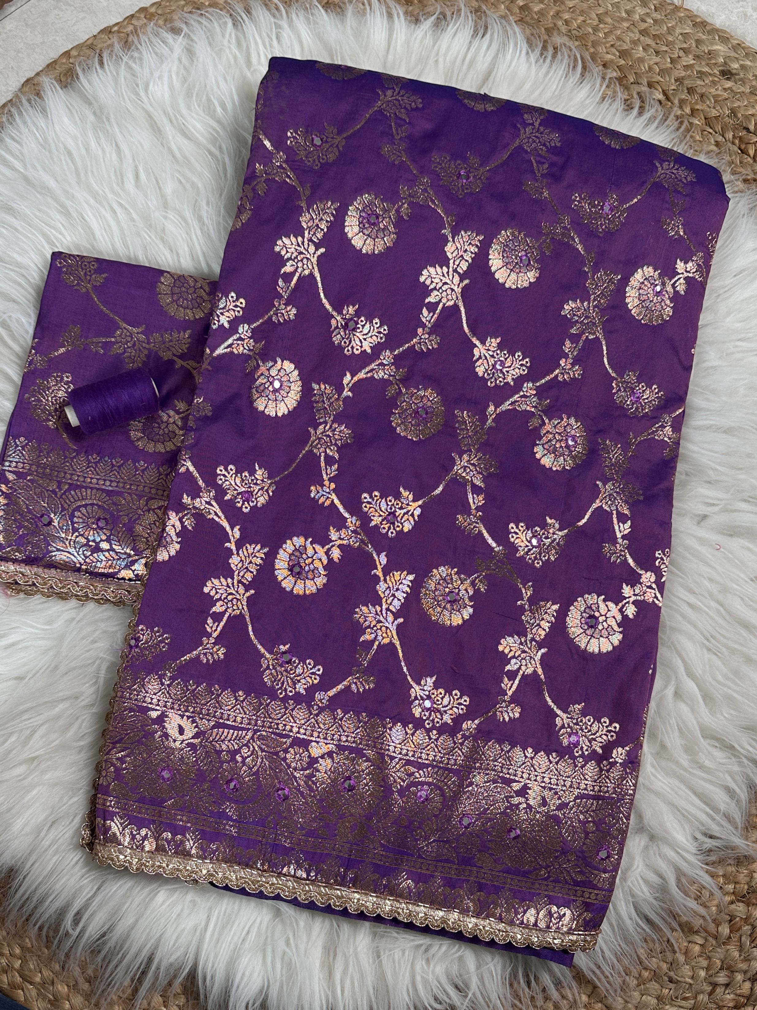 this Banarasi Silk Saree is designed to make your festive moments shine.
Featuring zari jacquard weaving