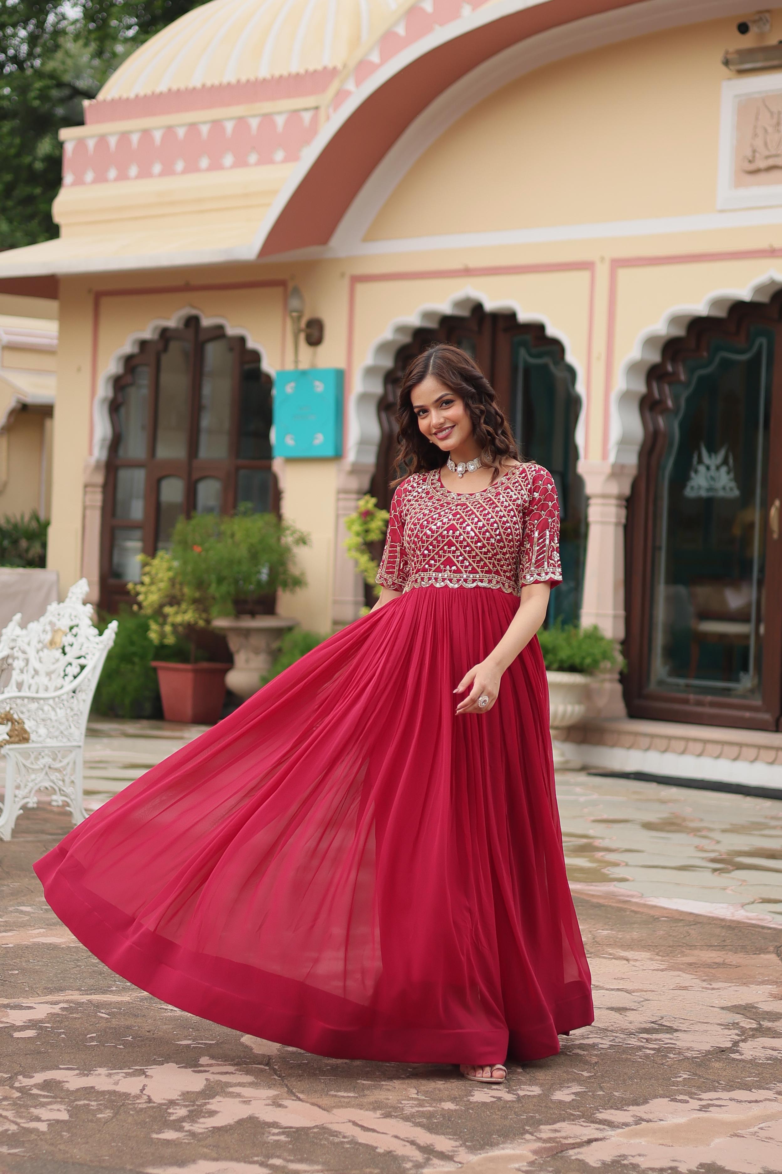Beautifully crafted with Zari Sequins Embroidered Work for a luxurious festive glow.
