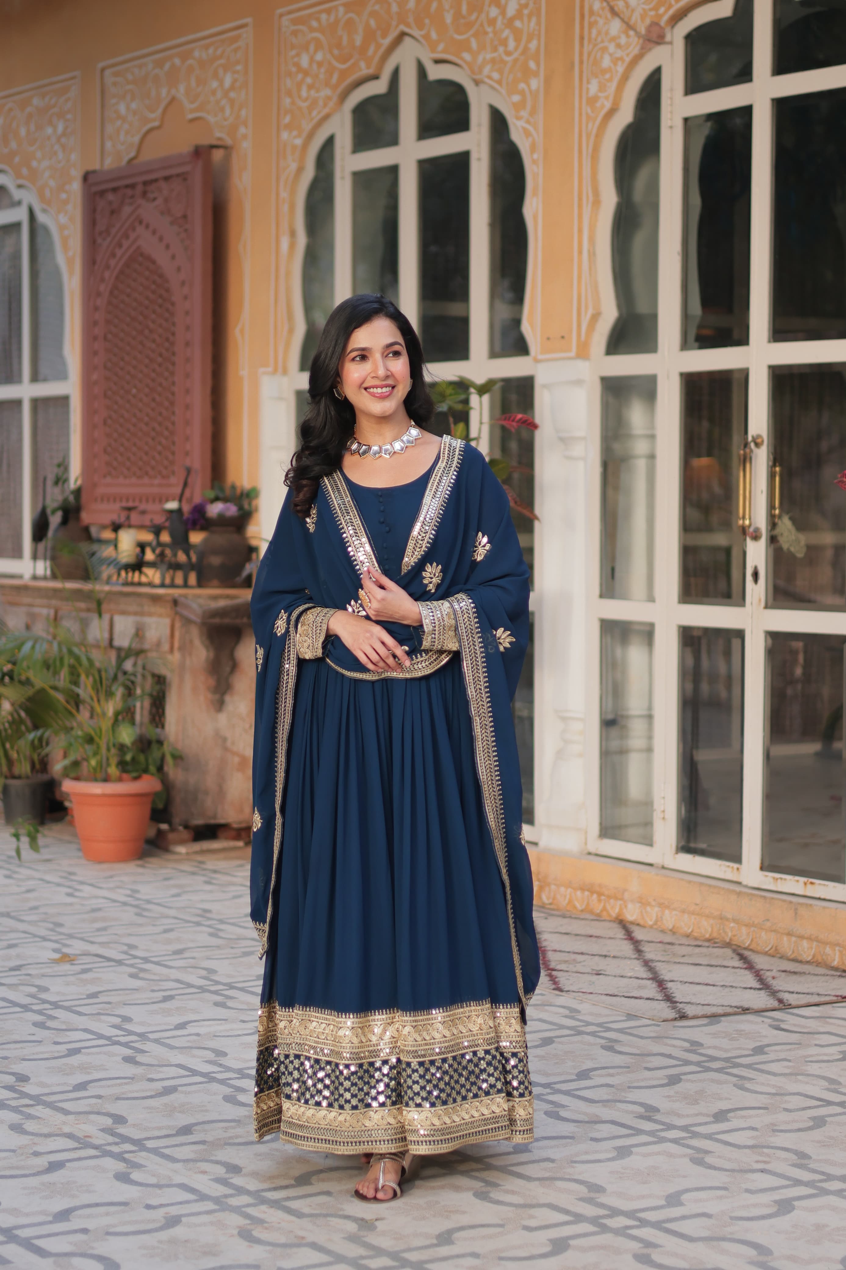 Front view of faux blooming embroidered sequin gown with dupatta