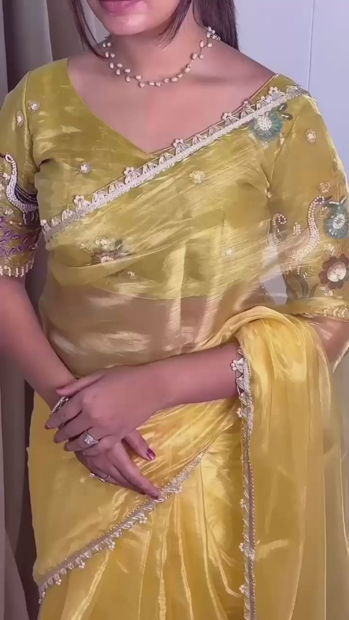 Bring home timeless elegance with this Liquid Organza Saree